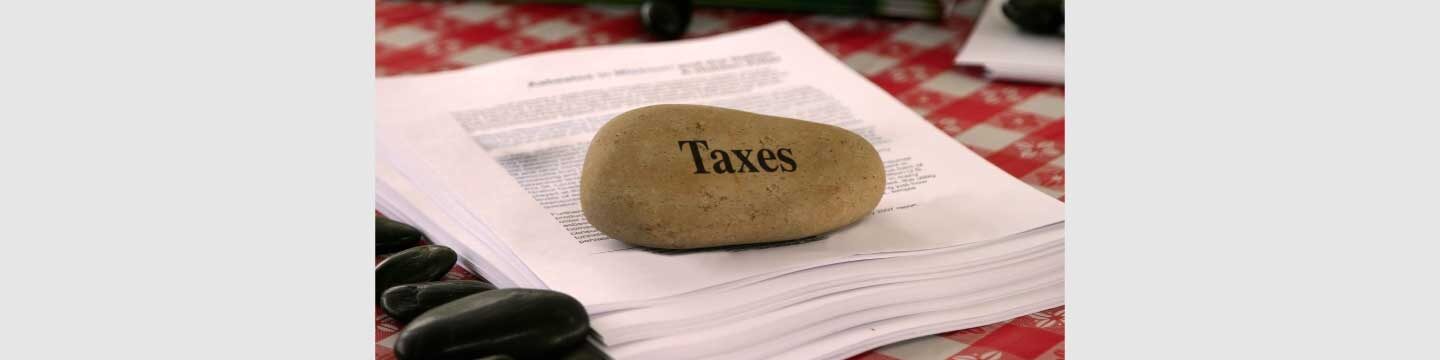 When can service tax and VAT be levied on purchase of property