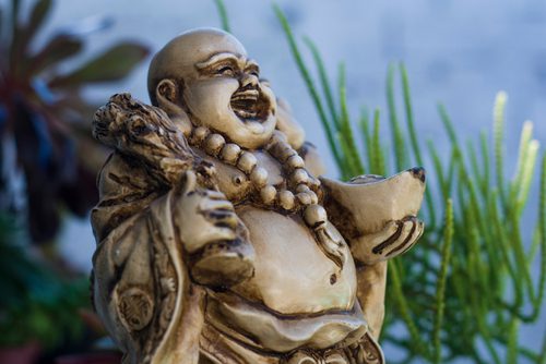 different types of laughing buddha statues