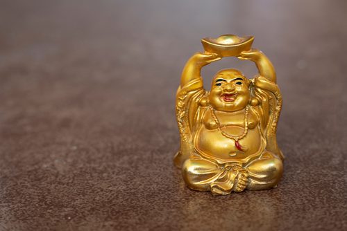 different types of laughing buddha statues