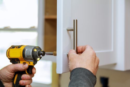 How to install overhead cabinets?
