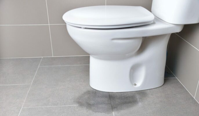 How to fix a leaking toilet base?