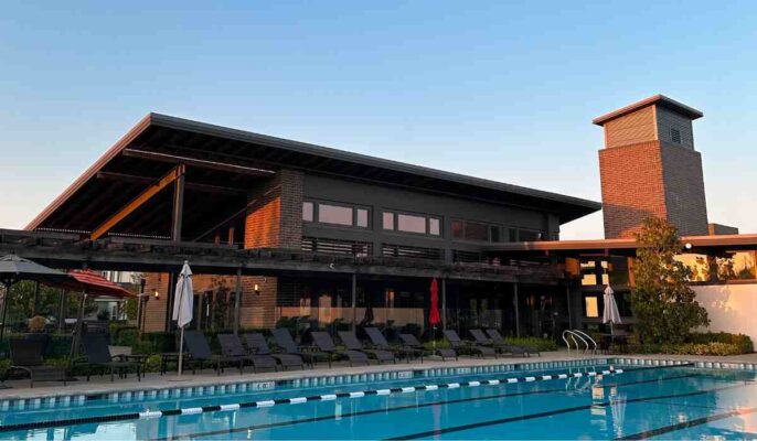 A house in a residential project with a well-equipped clubhouse has a higher resale value, as it stands out from other properties in the same area that lack such facilities.